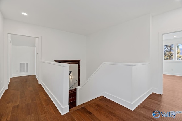 corridor featuring hardwood / wood-style flooring