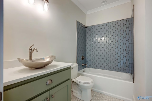 full bathroom featuring tile patterned flooring, toilet, vanity, and tiled shower / bath