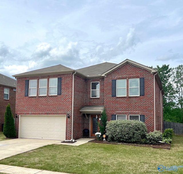 view of front of house featuring an attached garage, driveway, brick siding, and a front yard