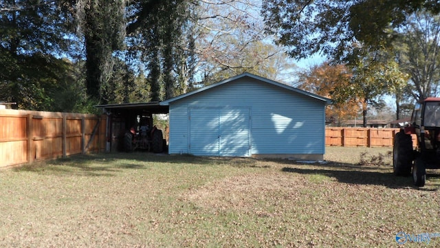 exterior space with a yard and a storage shed