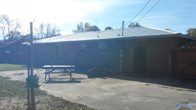 rear view of property with a patio area