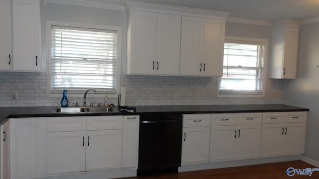 kitchen featuring dishwasher, crown molding, white cabinetry, and sink