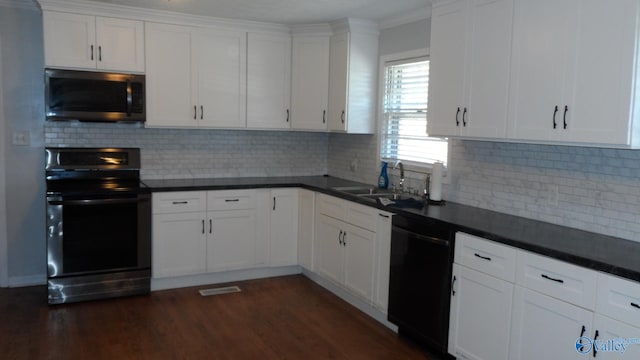 kitchen featuring sink, dark hardwood / wood-style floors, crown molding, white cabinets, and black appliances