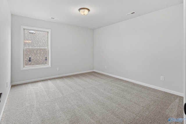 empty room featuring carpet floors