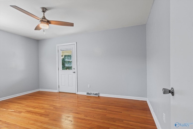 11021 Jean Rd SE, Huntsville, AL 35803 - unfurnished room with baseboards, a ceiling fan, visible vents, and light wood-style flooring