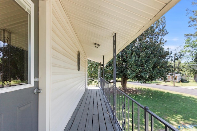 11021 Jean Rd SE, Huntsville, AL 35803 - wooden terrace with a yard and covered porch