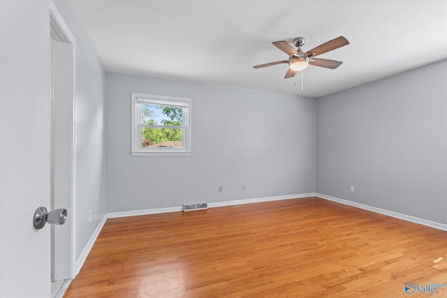 11021 Jean Rd SE, Huntsville, AL 35803 - unfurnished room with baseboards, a ceiling fan, light wood finished floors, and visible vents