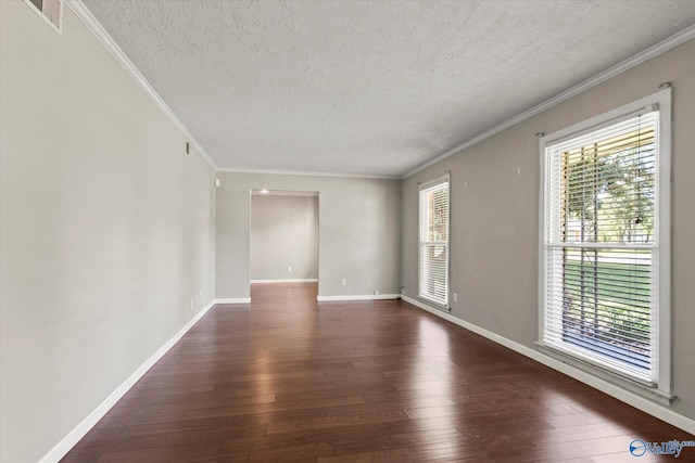 11021 Jean Rd SE, Huntsville, AL 35803 - spare room with dark wood finished floors, crown molding, and a textured ceiling