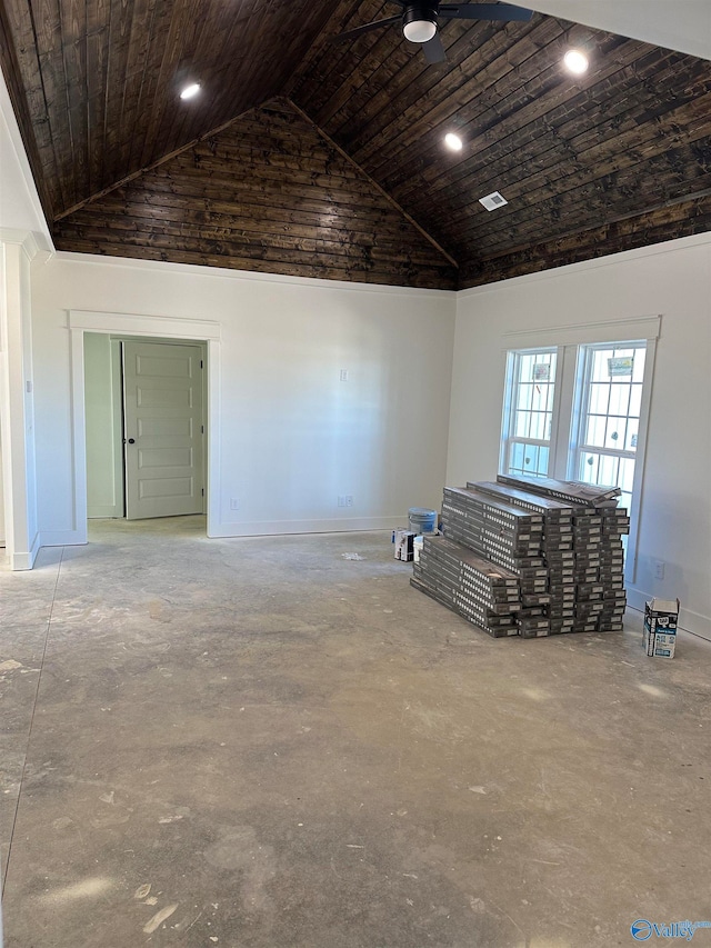 empty room with wood ceiling, ceiling fan, high vaulted ceiling, concrete floors, and baseboards