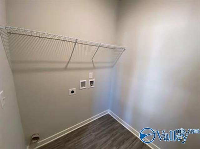 laundry room with hookup for a washing machine, dark wood-type flooring, and hookup for an electric dryer