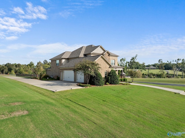 view of property exterior featuring a yard, driveway, and a garage