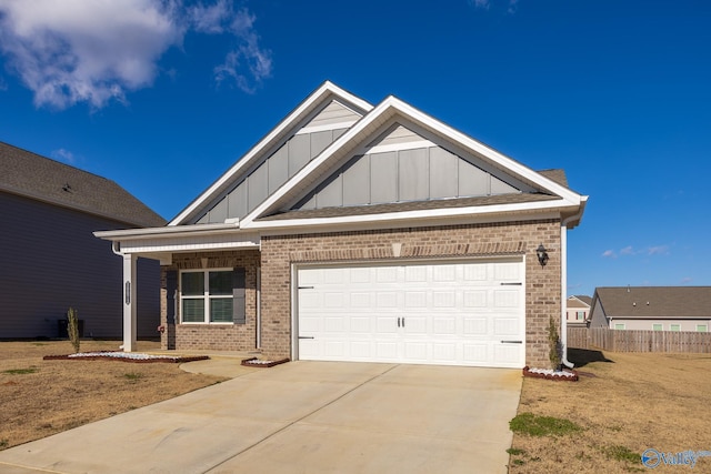 view of front of home featuring a porch and a garage