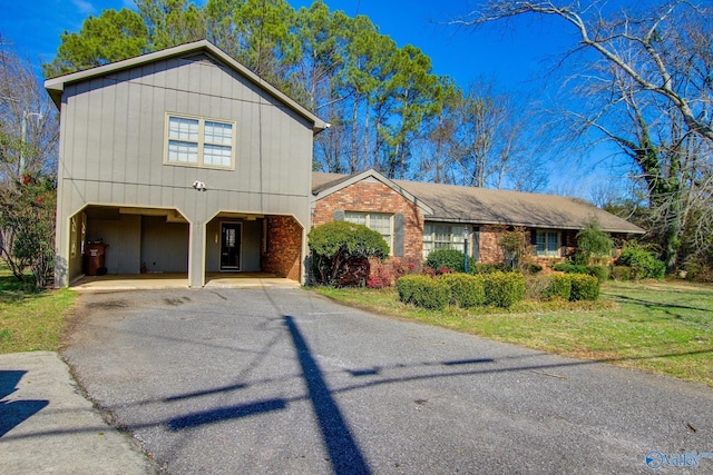 view of front of home with a carport