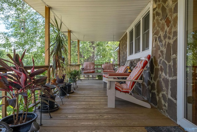 deck featuring covered porch