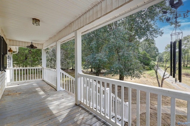 deck featuring ceiling fan and covered porch