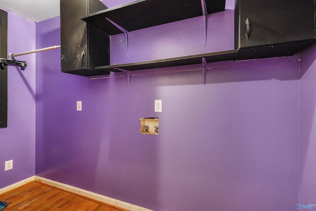 laundry area featuring hookup for a washing machine and wood-type flooring