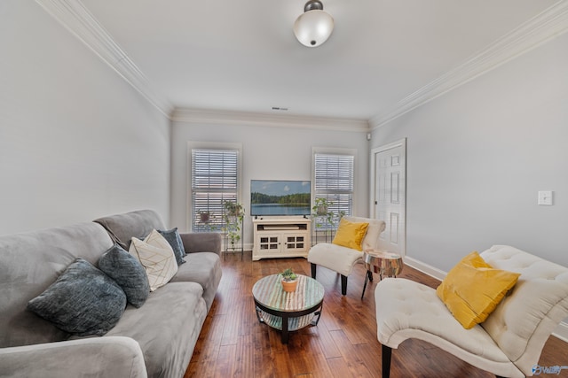 living room with hardwood / wood-style flooring and ornamental molding