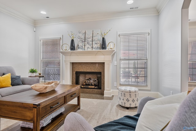 carpeted living room featuring ornamental molding