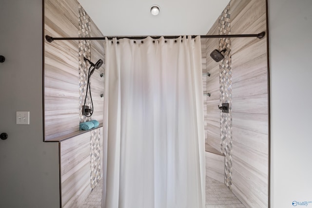 bathroom featuring a shower with curtain