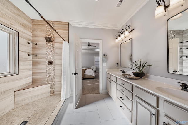 bathroom with ornamental molding, walk in shower, tile patterned floors, and vanity