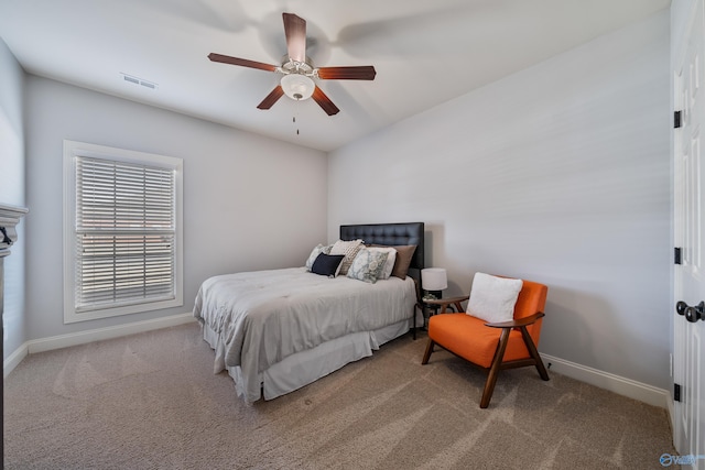 bedroom with light colored carpet and ceiling fan