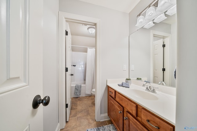 full bathroom featuring vanity, shower / bath combination with curtain, and toilet