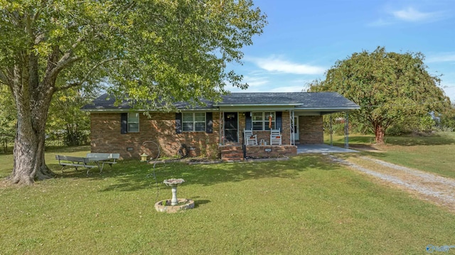 ranch-style home featuring a front yard