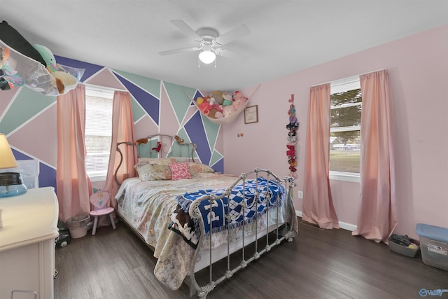 bedroom featuring dark wood-type flooring and ceiling fan