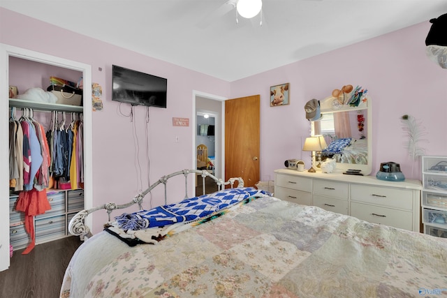 bedroom featuring a closet, wood-type flooring, and ceiling fan