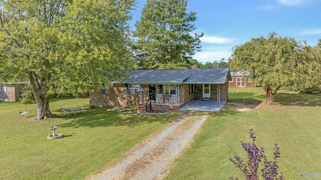 view of front of house featuring a porch and a front lawn