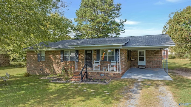 ranch-style house with a front lawn and a porch