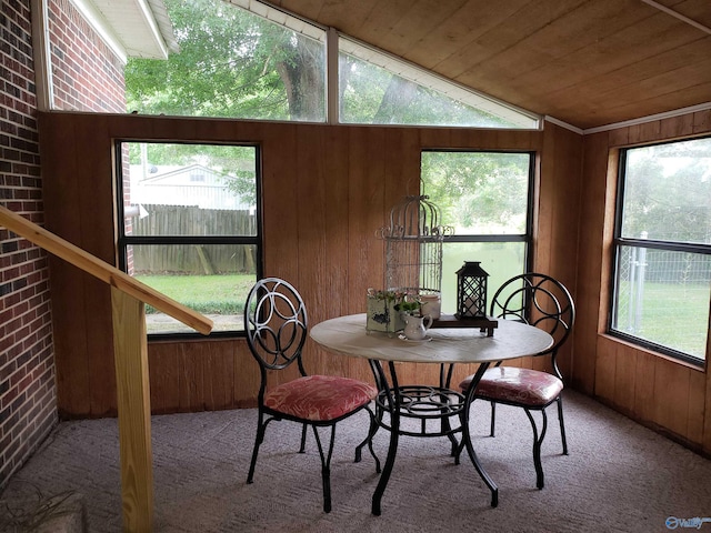 sunroom / solarium with vaulted ceiling and wooden ceiling