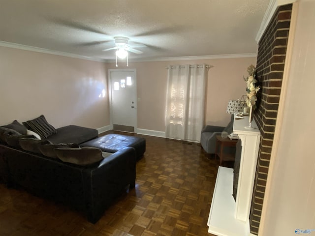 living room featuring ceiling fan, dark parquet floors, ornamental molding, and a textured ceiling