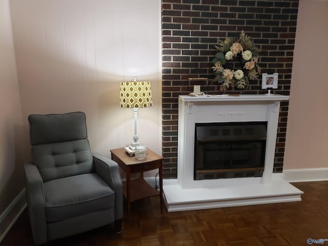 living area featuring dark parquet floors