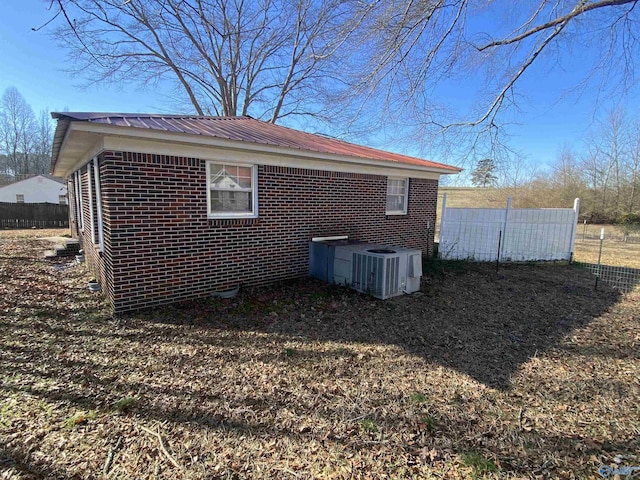 view of property exterior with cooling unit