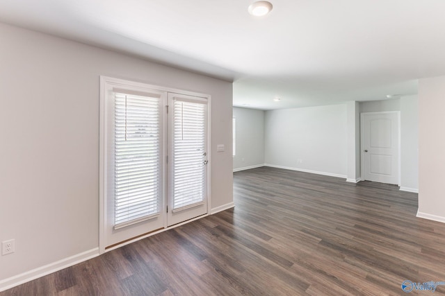 196 Murphy Ln, Madison, AL 35756 - empty room featuring dark wood-style floors and baseboards