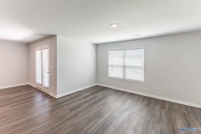 196 Murphy Ln, Madison, AL 35756 - unfurnished room with dark wood finished floors and baseboards