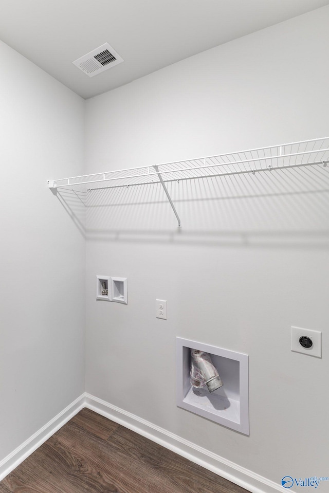 196 Murphy Ln, Madison, AL 35756 - laundry area featuring electric dryer hookup, dark wood-style flooring, washer hookup, and baseboards