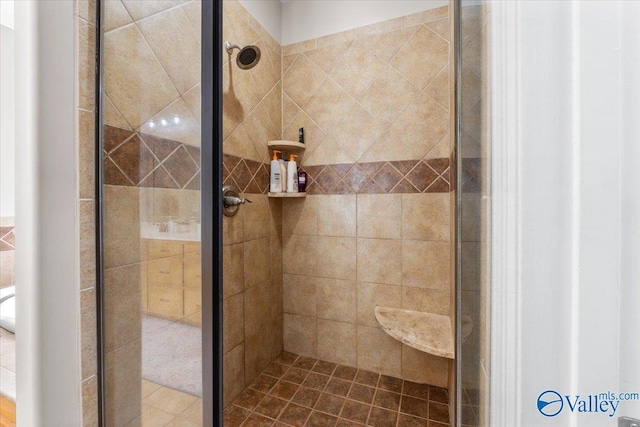 bathroom with a stall shower
