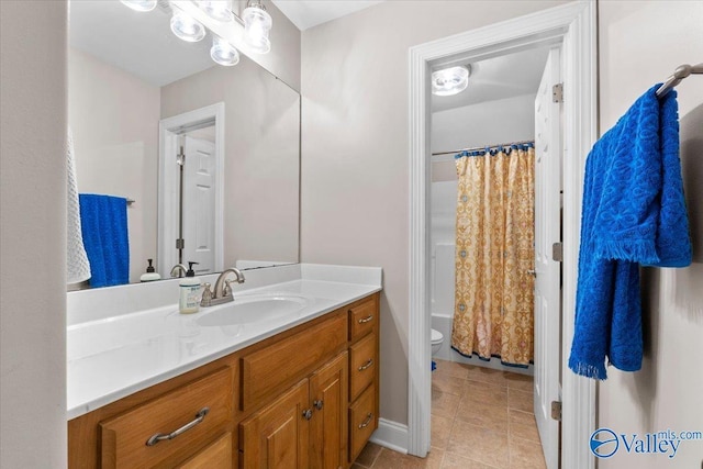 full bath with vanity, tile patterned flooring, shower / bath combo with shower curtain, and toilet