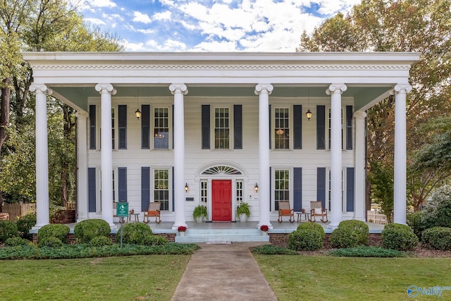 904 Line St NE, Decatur, AL 35601 - neoclassical home with a porch and a front lawn