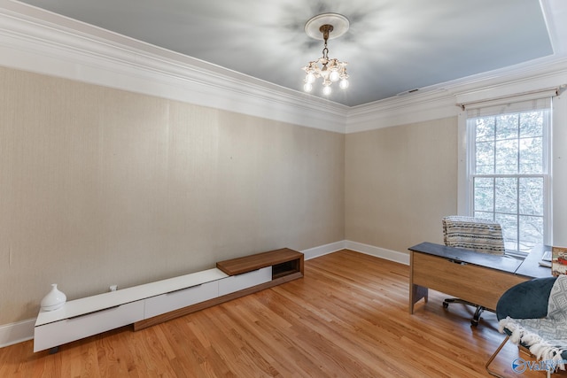 home office with ornamental molding, a chandelier, and wood-type flooring