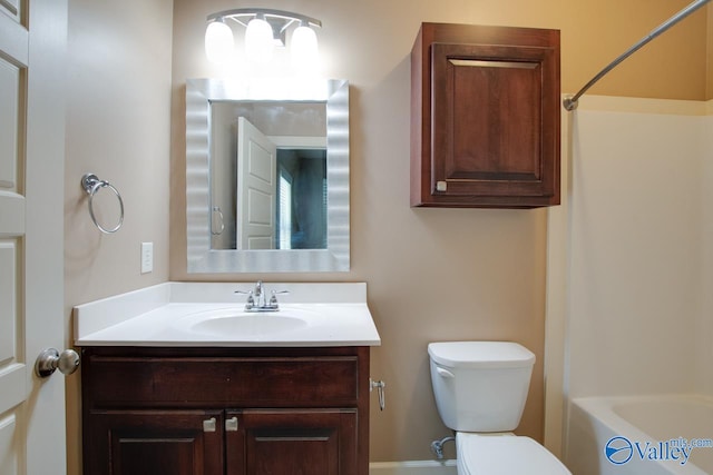 full bathroom with shower / bath combination, toilet, and vanity