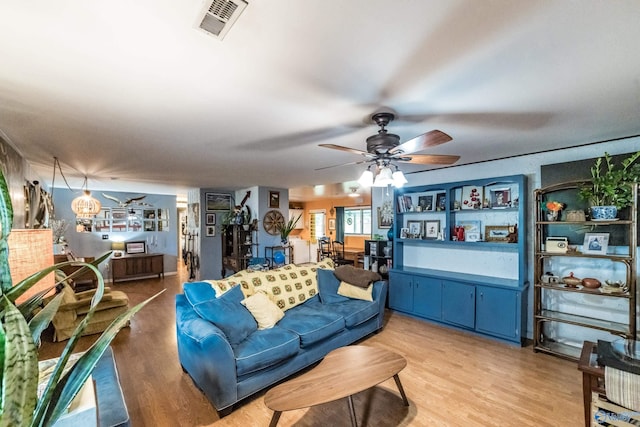 2122 Fernbrook Dr NE, Huntsville, AL 35811 - living area with ceiling fan and light wood finished floors