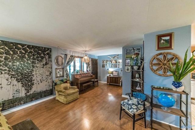 2122 Fernbrook Dr NE, Huntsville, AL 35811 - living area featuring wood finished floors and baseboards