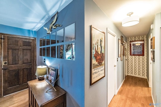 2122 Fernbrook Dr NE, Huntsville, AL 35811 - hallway with wood finished floors and baseboards