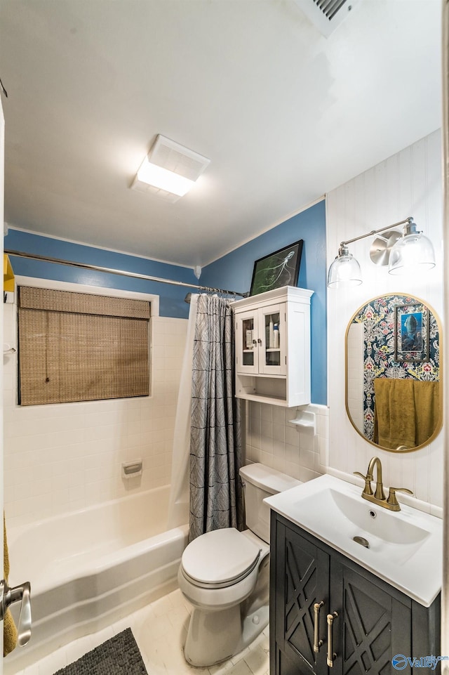 2122 Fernbrook Dr NE, Huntsville, AL 35811 - bathroom with toilet, shower / bath combo, tile walls, and vanity