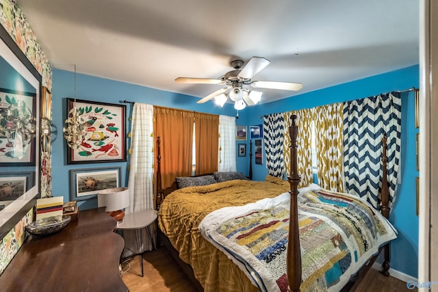 2122 Fernbrook Dr NE, Huntsville, AL 35811 - bedroom with wood finished floors and ceiling fan