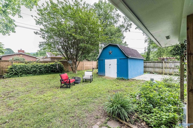 2122 Fernbrook Dr NE, Huntsville, AL 35811 - view of yard featuring a storage unit and an outbuilding