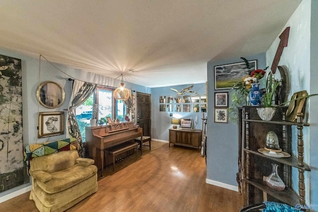 2122 Fernbrook Dr NE, Huntsville, AL 35811 - sitting room featuring wood finished floors and baseboards